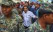 Maldivian president Yameen Abdul Gayoom, center, surrounded