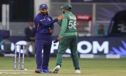 Indias captain Virat Kohli, left, and Pakistans captain