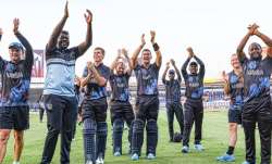 Namibian players gesture to the crowd after qualifying for T20 World Cup Super 12 stage in Sharjah o