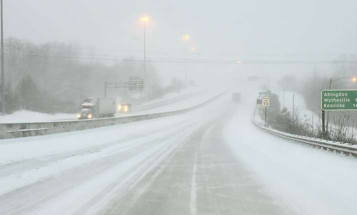 Accidents on snow-covered interstates caused major delays,