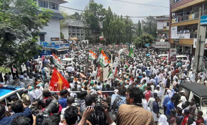 Clad in white, Rahul Gandhi shook hands with a couple of