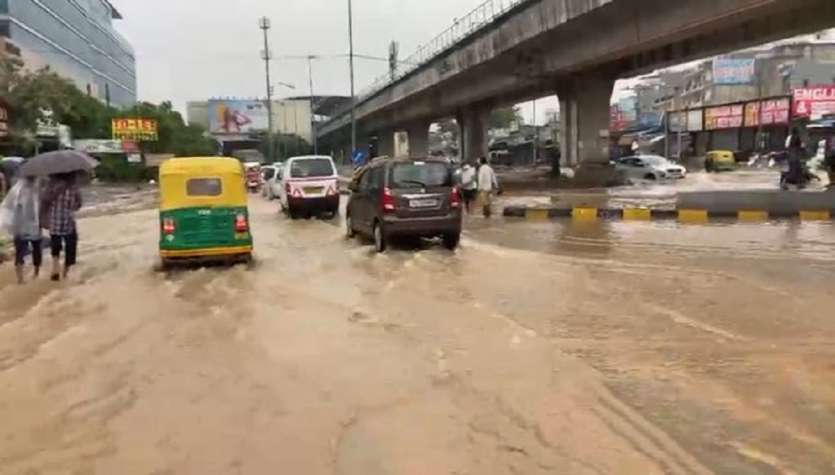 Waterlogging at Bristol Chowk in Gurugram. Traffic police personnel are on the spot