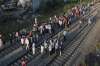 About sixty people were mowed down by a train that hurtled