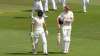 Jos Buttler and Zak Crawley of England walk off at lunch