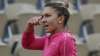 Romania's Simona Halep gestures in her match against