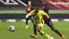 Frankfurt's Evan N'Dicka, right, and Dortmund's Youssoufa