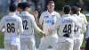 New Zealand's Tim Southee, centre, celebrates his 300th