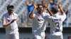 India's Ravichandran Ashwin, centre, celebrates with