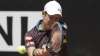 Japan's Kei Nishikori returns the ball to Italy's Fabio