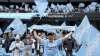 Fans celebrate the start of the English Premier League