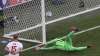 Poland's goalkeeper Wojciech Szczesny scores an own goal