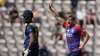 England's David Willey, right, celebrates taking the wicket