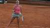 Poland's Iga Swiatek celebrates after defeating Ukraine's