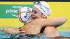 Australian swimmer breaks 100-meter backstroke world record