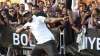 Jamaican sprinter Usain Bolt strikes his now-famous victory