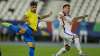 Brazil's Lucas Paqueta shots to score the opening goal