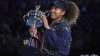 Japan's Naomi Osaka holds the Daphne Akhurst Memorial Cup