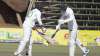 Mohammad Mahmudullah, left, greets fellow batsman Taskin Ahmed