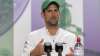 Novak Djokovic attends a press conference after winning the