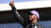 Mercedes driver Lewis Hamilton of Britain gives a thumbs up