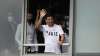 Lionel Messi waves after arriving at Le Bourget airport,