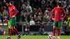 Portugal's Cristiano Ronaldo, left, and Portugal's Joao Felix react after Serbia's Aleksandar Mitrov