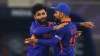 Ravi Jadeja of India celebrates the wicket of Richard Berrington of Scotland with team mate Virat K