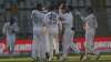 India's players celebrates the dismissal of New Zealand's Daryl Mitchell during the day three of th