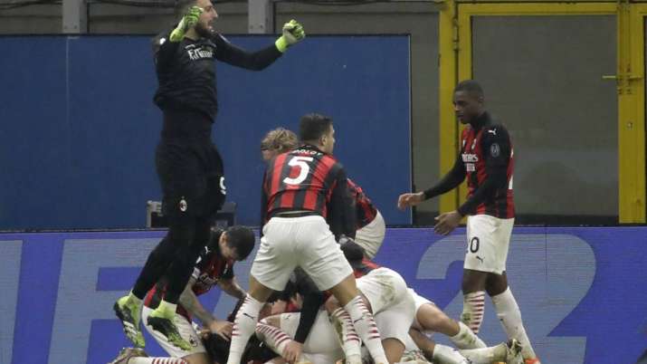 AC Milan players celebrate the third goal against Lazio
